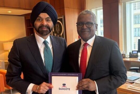 Photo: World Bank President Plays Host To Aliko Dangote In Washington DC …the President/Chief Executive of Dangote Industries Limited, Aliko Dangote (right) presenting a souvenir to the President of World Bank Group, Mr. Ajay Banga…