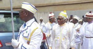 2027 Election: Shun Vote Buying, Cleric Urges Nigerians Men in white ceremonial robes and hats walk in a procession; the front man carries a tall silver staff.