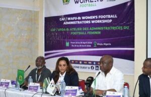 WAFU-B Elated As Gusau Promises Vehicle For Movement Of VAR Equipment Round Zone Panel of four officials seated at a long table during a CAF/WAFU-B Women’s Football Administrators Workshop, with a purple banner behind them.