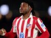 UCL: I’m Ready For Arsenal Showdown—Lookman Soccer player in a red-and-white striped Atlético Madrid jersey runs on the field during a match.