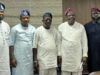 Oyo APC Governorship Aspirants Rebuff ‘Undemocratic Practices’, Seek Reconciliation Five men in traditional West African outfits pose together indoors, wearing light to dark robes and head wraps.