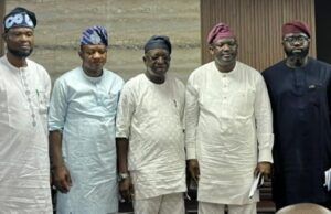 Oyo APC Governorship Aspirants Rebuff ‘Undemocratic Practices’, Seek Reconciliation Five men in traditional West African outfits pose together indoors, wearing light to dark robes and head wraps.