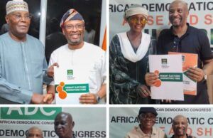 2027: Abidikugu Picks ADC Nomination Forms To Contest House Of Reps Seat For Ibadan North East/ South East Two men in traditional attire shake hands while holding an election nomination form at an ADC event.