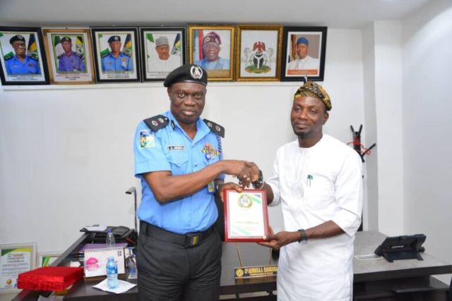 Akeem Abas CP Ayodeji Abimbola, left, with Comrade Akeem Abas...