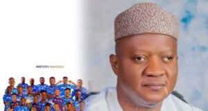 Return To Continental Football: Akeem Agbaje Congratulates Shooting Stars Of Ibadan Commemorative poster showing a large group of people in matching blue outfits on the left and a man in white traditional attire on the right. The text suggests a celebration of 27 years later and a brand or event called Continental.