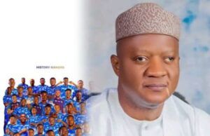 Return To Continental Football: Akeem Agbaje Congratulates Shooting Stars Of Ibadan Commemorative poster showing a large group of people in matching blue outfits on the left and a man in white traditional attire on the right. The text suggests a celebration of 27 years later and a brand or event called Continental.