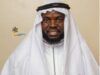 Eid-El-Kabir: Giwa Charges Muslims To Pray For Safe Return Of Abducted Victims In Oyo State Man in white traditional attire with a headscarf, hands held together in front, facing the camera (logo visible on left).