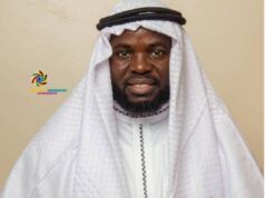 Eid-El-Kabir: Giwa Charges Muslims To Pray For Safe Return Of Abducted Victims In Oyo State Man in white traditional attire with a headscarf, hands held together in front, facing the camera (logo visible on left).
