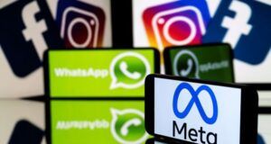 Meta Launches Paid Subscriptions For Instagram, Facebook, Whatsapp Foreground screen displays the Meta logo; background screens show WhatsApp icons and blurred Facebook/Instagram logos.