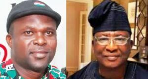 Oyo NLC Congratulates NUPENG’s New President, Salimon Oladiti Two men posing side by side: left man in a green patterned shirt and cap, right man in dark traditional attire with a cap and glasses.