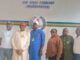 SYDI DG, POCACOV Southwest Chairman Visit Oyo CP Over Abduction In Oriire Six people stand side by side in front of a wall reading 'OYO STATE COMMAND HEADQUARTERS,' with a circular emblem and colored stripes behind them.