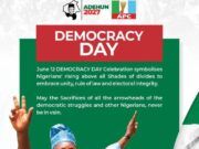 Barr. Akeem Agbaje Reaffirms Support For Tinubu’s Reforms, Honours June 12 Heroes Democracy Day poster with Nigerians raising hands in celebration; green and red panels and text about unity, rule of law, and electoral integrity, plus ADEHUN 2027 APC logos at top.