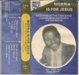 Front cover of a Nigerian gospel cassette: title 'Nigeria is for Jesus,' blue and yellow design, portrait of Bro. Yinka Fele (band leader) in a circular frame, with text about the Time Band and song list on the left.