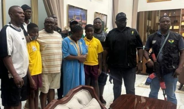 Bayo Adelabu Family Mrs. Olaide Busayo Adegoke John-Paul and her 12-year-old twin sons, Peter and Paul...with others after their release was secured by the Police....