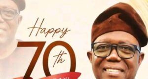 Barr Akeem Agbaje Celebrates Former Oyo Speaker Dr. Onigbinde (SAN) At 70 Smiling man in glasses and a brown cap beside a 'Happy 70th Birthday' banner honoring Rt. Hon. Dr. Akin Onigbinde (SAN).