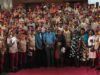 OYRTMA Trains Officers On Public Safety, Intelligence Gathering Large group of uniformed officers with red berets posing for a formal group photo, civilians in front on a red carpet.