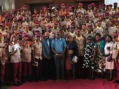 OYRTMA Trains Officers On Public Safety, Intelligence Gathering Large group of uniformed officers with red berets posing for a formal group photo, civilians in front on a red carpet.
