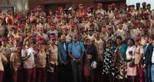OYRTMA Trains Officers On Public Safety, Intelligence Gathering Large group of uniformed officers with red berets posing for a formal group photo, civilians in front on a red carpet.
