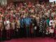 OYRTMA Trains Officers On Public Safety, Intelligence Gathering Large group of uniformed officers with red berets posing for a formal group photo, civilians in front on a red carpet.