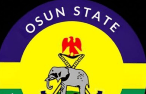 Police Arrest 3 Suspected Cultists, Political Thugs In Osun, Recover Weapons Logo of Osun State Police Command, featuring Nigeria Police emblem with a yellow center and purple top band, green bottom band, and an elephant with a red crest above a blue banner reading 'The Nigeria Police'.