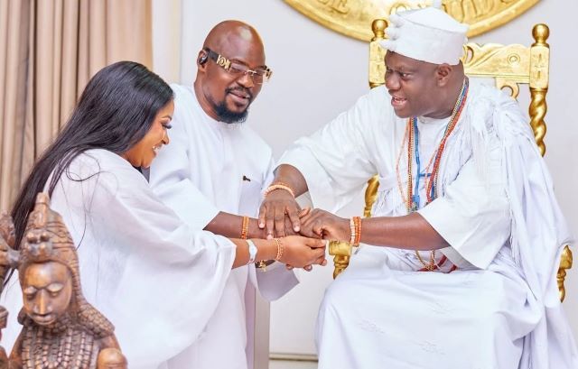 Baba Ijesha and Ooni Ooni Adeyeye Ogunwusi, right, with Baba Ijesha and wife...