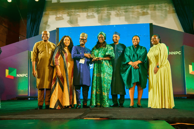 Shell Image7 …Joseph Mordi, General Manager, Wells & Geoscience Operations, Shell Nigeria Exploration and Production Company Limited (SNEPCo), alongside other Shell leaders, receives an award from the Special Adviser to the President on Energy, Olu Verheijen, during the NNPC Awards Night and Dinner at the 2026 Nigeria Oil and Gas (NOG) Conference and Exhibition in Abuja…