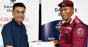Road Safety In Ogun: Dangote Cement Ibese, FRSC Strengthen Strategic Partnership …Dangote Cement Ibese Plant Director, Mr. Ayyagari Subbaraidu (left) presents a gift to the Sector Commander, Federal Road Safety Corps (FRSC), Ogun State, Sector Commander Oludare Ogunjobi during the visit…