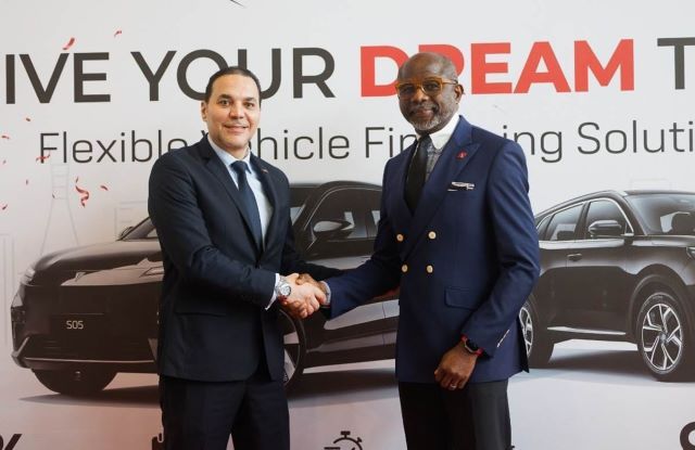 UBA Image …General Manager, Mikano Motors, Tarek Mostafa and Executive Director, Personal and Business Banking, United Bank for Africa, Chidi Okpala during a partnership signing ceremony between both parties, themed: ‘Drive Your Dreams Today’, a Flexible vehicle financing solutions, at the Mikano Showroom in Victoria Island, Lagos…