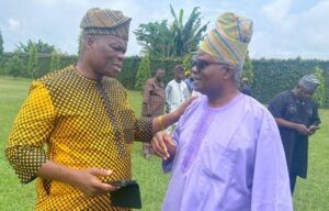 Photos: All You Need To Know About How Culture-Loving Ibadan Chief, Lekan Alabi Was Buried 7 Dr Wasiu Olatubosun, Oyo's Commissioner for Culture and Tourism, left, with another mourner...