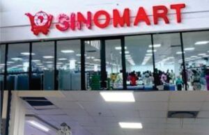 Leaking Roof Embarrasses Sinomart Superstore’ Ibadan Customers Days After Official Opening Sinomart Ibadan...with ladder for emergency repairmen...on Wednesday...