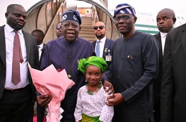 Tinubu back (2) President Bola Tinubu and others when he landed in Lagos on Tuesday...