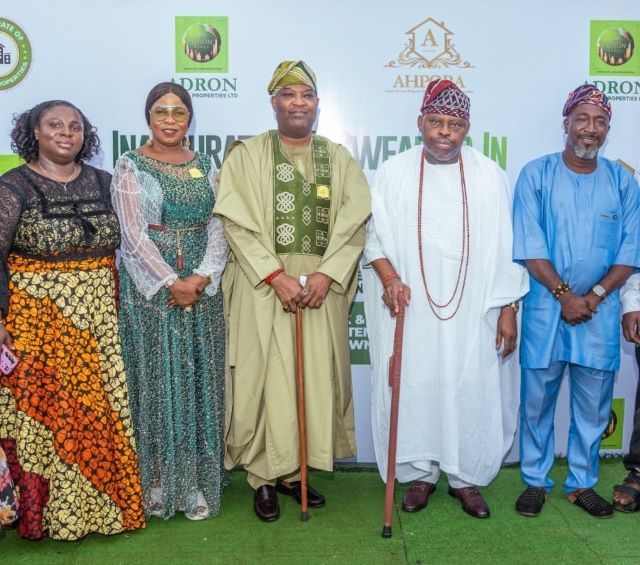 ADRON (2) L-R: Mrs. Augustina Chuks, Chairman uptown zone, Mrs Adenike Ajobo, MD Adron Homes, Sir, Aare Adetola EmmanuelKing KOF, Chairman/GCEO Adron Homes Properties Limited, HRH, Oba Peter Oluwole Ogunbayo, Otete III, Odemo of Isara Remo, Alhaji Akeem Segun Koletowo, Chairman, Downtown Zone at the inauguration and swearing in ceremony of Adron Homes & Property Owners & Residents Association (AHPORA) EXCOs of Treasure Park & Gardens Phase 2, Downtown Estate, Shimawa Ogun State, on Sunday, 18th October, 2026 held at the Event Ground of the Estate...