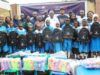 Excitement As Dangote Cement Boosts Learning In Lagos Host Community Group photograph of students and pupils of Ladi-Lak Nursery and Primary Schools and management team of Dangote Cement during the donation of the school items...