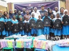 Excitement As Dangote Cement Boosts Learning In Lagos Host Community Group photograph of students and pupils of Ladi-Lak Nursery and Primary Schools and management team of Dangote Cement during the donation of the school items...